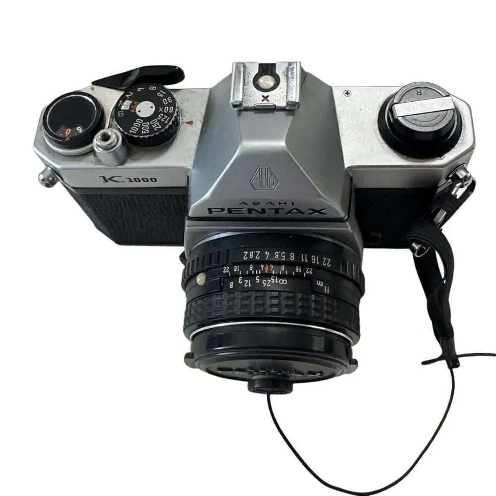 Pentax K1000 35mm SLR Camera w/SMC Pentax-M 50mm f/1.2 Lens, flash & mini tripod